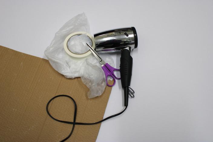 hairdryer scissors tape and cardboard